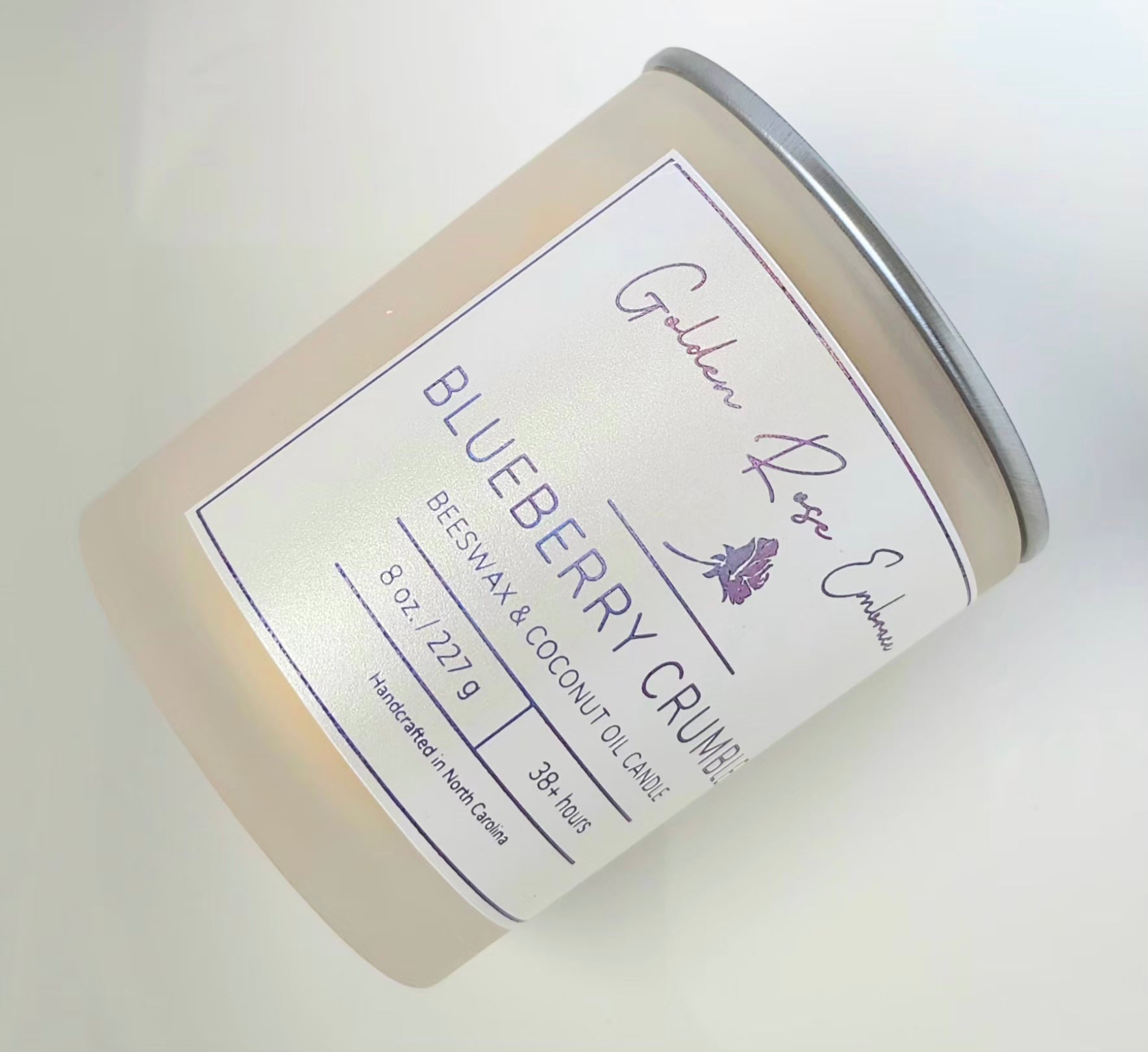 8 oz beeswax candles, cotton wick, frosted glass jar, gold lid, butter, sugar, blueberry, vanilla, and graham cracker.