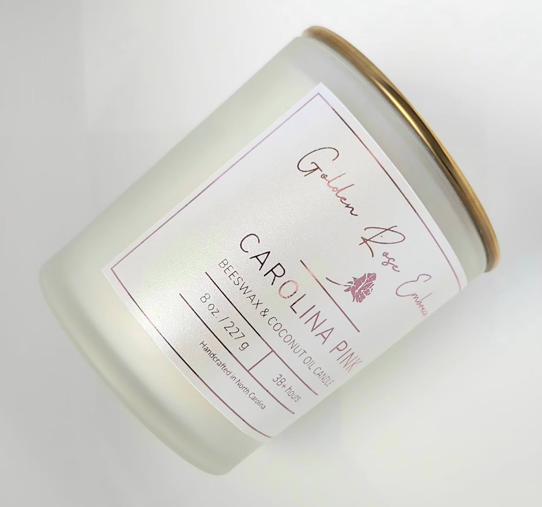 8 oz beeswax candles, woodwick candles,  frosted glass jar, gold lid, rosy pink peony, green foliage, spice fragrance.