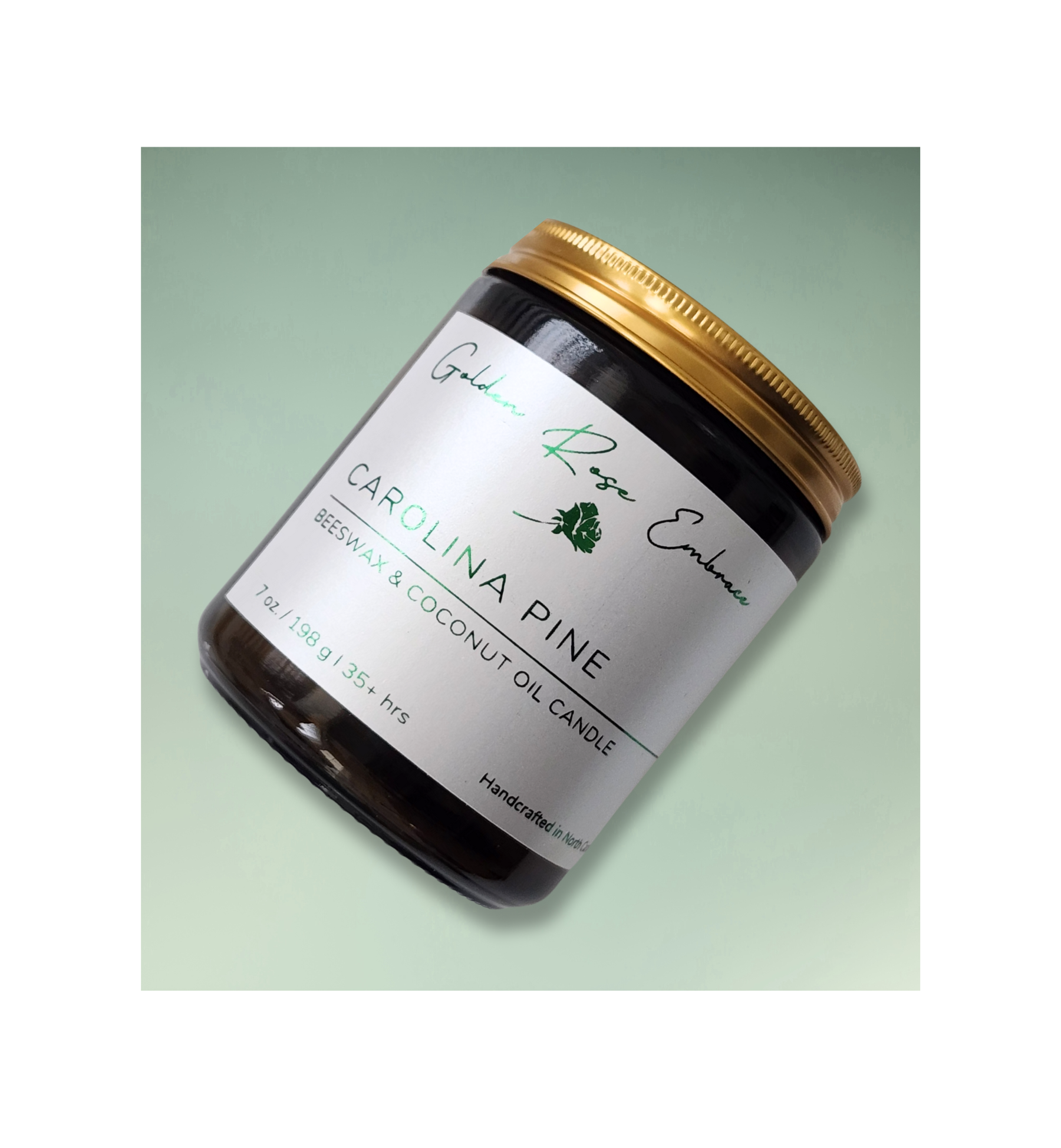 Carolina Pine 7oz Beeswax Candle. Amber glass jar. Gold metal lid. Cotton wick. 
An aroma of cypress, zesty lemon peel, woodsy evergreen, cedar, fir, amber, and moss evokes fond memories of walking through the Carolina woods. 