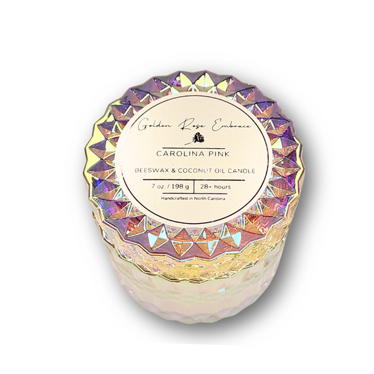 Carolina Pink 7 oz beeswax candles, pink iridescent posh glass jar, woodwick candles, aroma of rosy pink peony, green foliage, and a touch of spice.