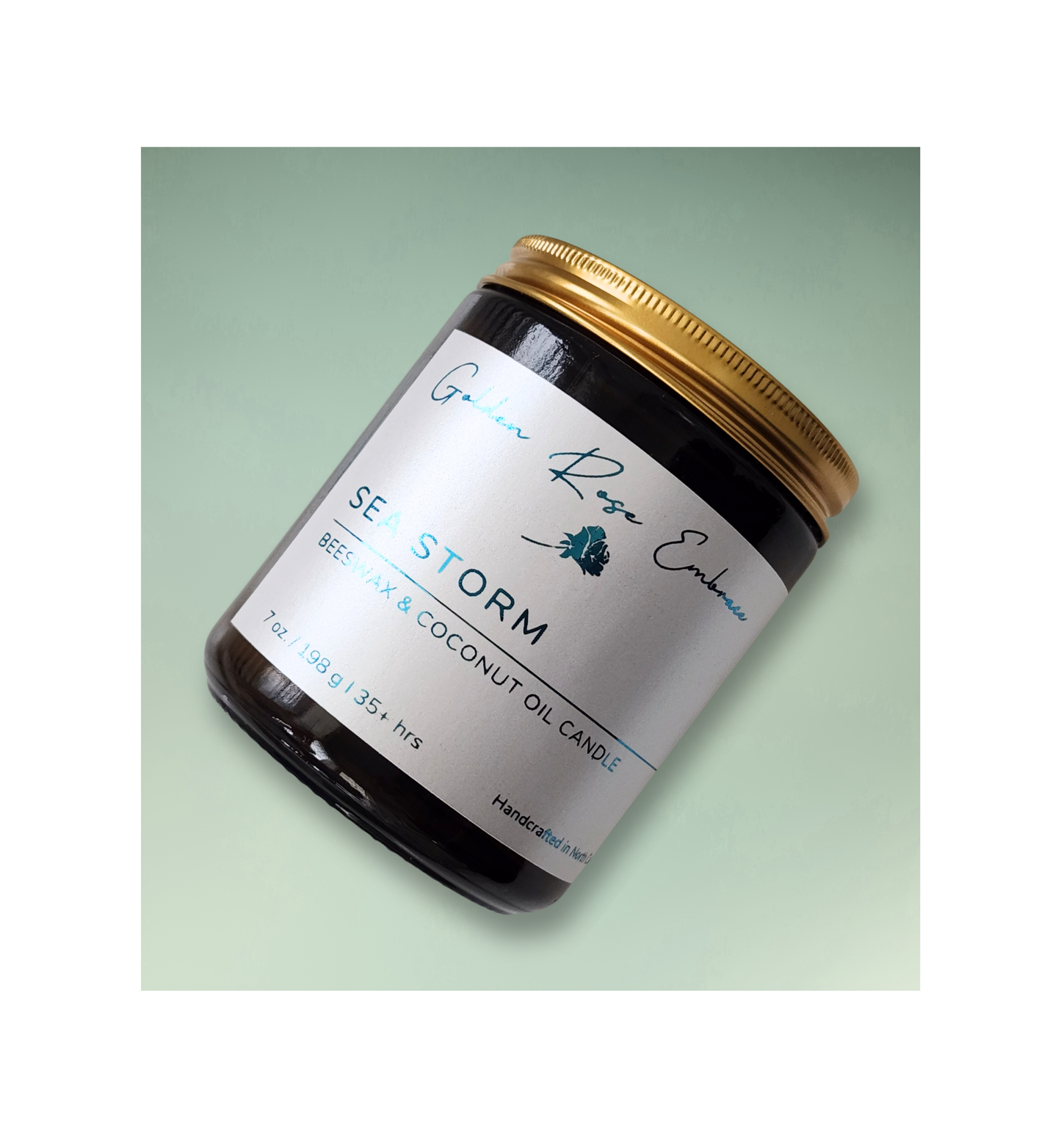 Sea Storm 7oz Beeswax Candle. Amber glass jar. Gold metal lid. Cotton wick. 
A light and airy scent of clean freshness and crisp linen, freesia, sea salt, eucalyptus, and moss to create a calming and peaceful vibe. 