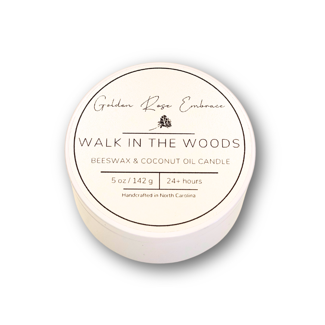 Walk in the Woods 5 oz Beeswax Candles, white tin, woodwick candles, earthy scent of mahogany, lavender, and geranium, evoking a warm and masculine aroma.
