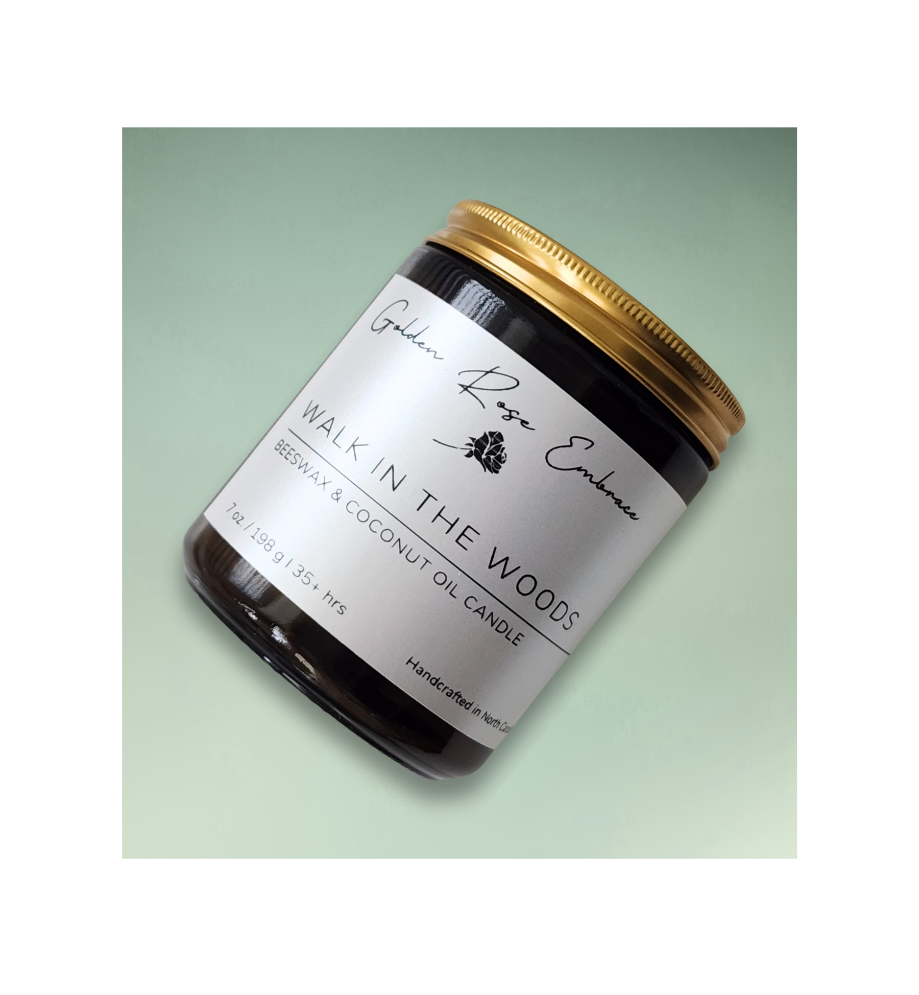Walk in the Woods 7oz Beeswax Candle. Amber glass jar. Gold metal lid. Cotton wick. 
An earthy scent of mahogany, lavender, and geranium, evoking a warm and masculine aroma. Perfect for outdoor enthusiasts looking to enhance their senses. 