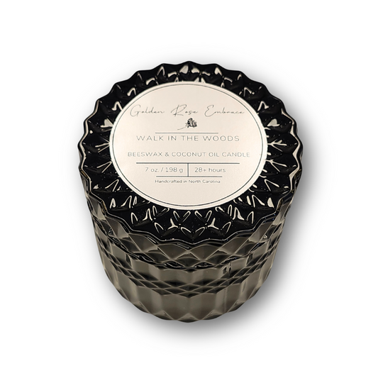 Walk in the Woods 7 oz Beeswax Candles, black posh glass jar, woodwick candles, earthy scent of mahogany, lavender, and geranium, evoking a warm and masculine aroma.