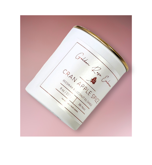 Orange Peel, Apple, Cranberry, Sugar, Cinnamon, Clove, Wood. white candle jar and gold lid