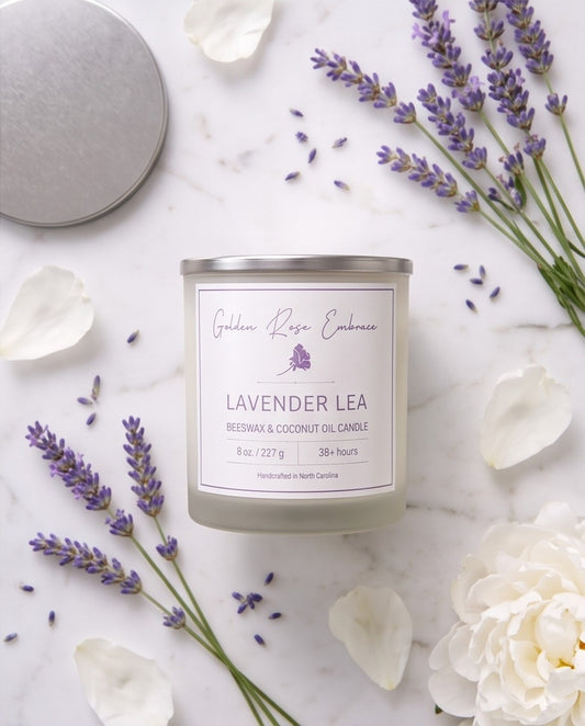 Lavender Lea 8oz Beeswax Candle.
Frosted glass, metallic silver lid, woodwick.
Notes of Lemon, Green, Herbal, Eucalyptus, Lavender, Geranium, Rose, Violet, Tonka Bean, Musk, Citrus, Bergamot, Camphor, and Powder.
A calming and relaxing, warm, soothing aroma of a lavender meadow with rows of lavender flowers drenched in the morning sunlight gently shifting in the breeze.
Custom beeswax candle blended with organic coconut oil and fragrances infused with clean nontoxic fragrance and essential oils. 