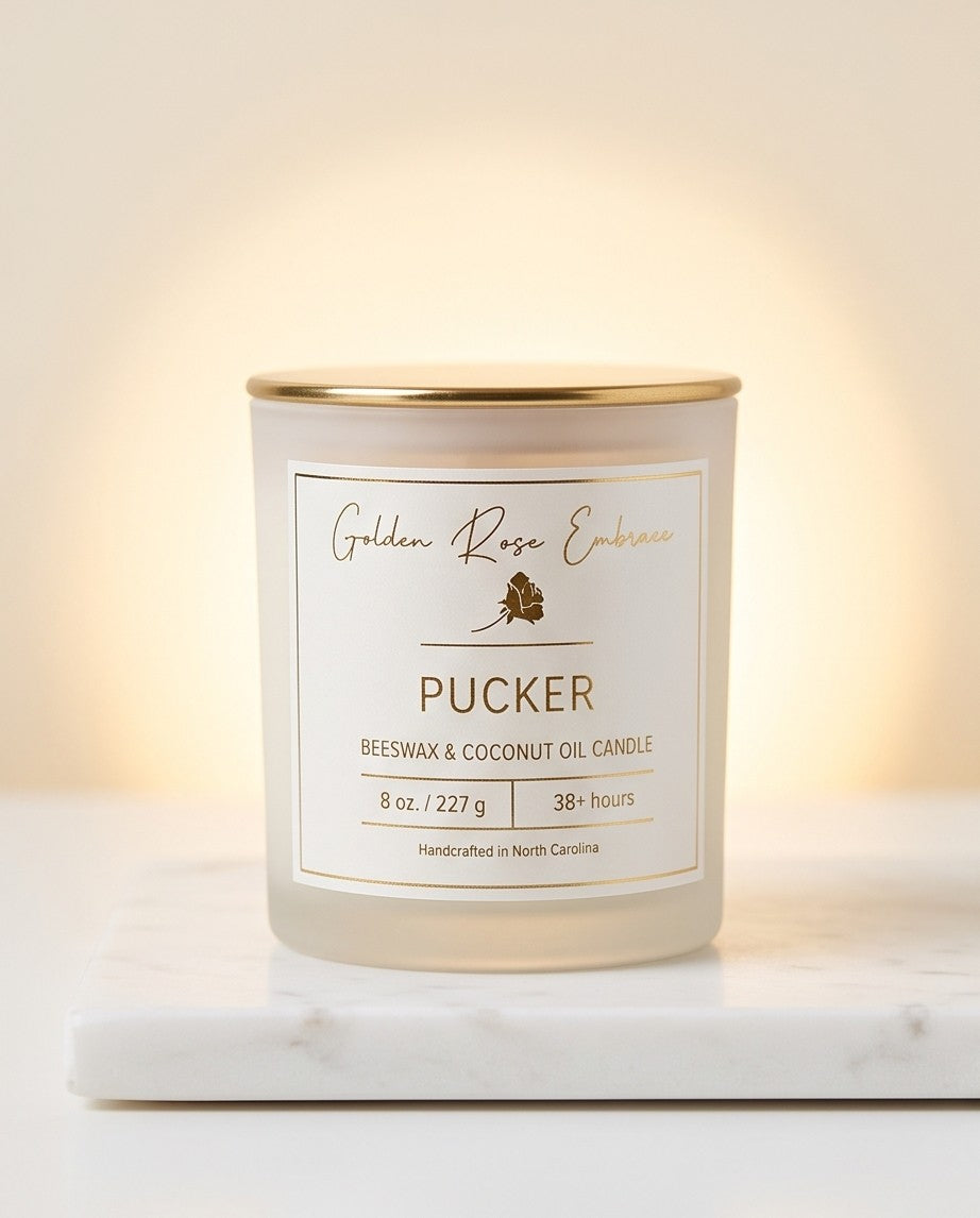 Pucker 8oz Beeswax Candle. 
Frosted glass jar, gold metallic lid, and woodwick. 
Notes of Watermelon, Lemon, Green Leaves, Strawberry, Pineapple, Gardenia, Sugar, Vanilla.

Infused with the rich aromas of juicy watermelon, mouth-puckering lemon, ripe strawberry, and sweet pineapple.

Custom beeswax candle blended with organic coconut oil and fragrances infused with clean nontoxic fragrance and natural essential oils. 