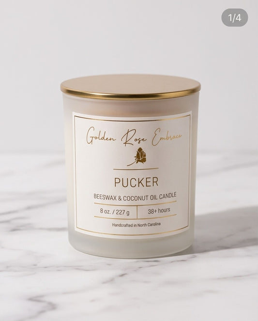Pucker 8oz Beeswax Candle. 
Frosted glass jar, gold metallic lid, and woodwick. 
Notes of Watermelon, Lemon, Green Leaves, Strawberry, Pineapple, Gardenia, Sugar, Vanilla.

Infused with the rich aromas of juicy watermelon, mouth-puckering lemon, ripe strawberry, and sweet pineapple.

Custom beeswax candle blended with organic coconut oil and fragrances infused with clean nontoxic fragrance and natural essential oils. 
