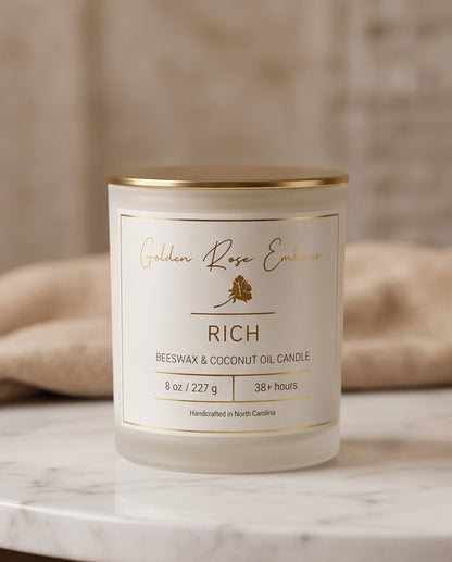 Rich 8oz Beeswax Candle.
Frosted glass, metallic gold lid, and woodwick.
Notes of Citrus, Cardamom, Palo Santo, Saffron, Violet, Wood, Sandalwood, Smoke, Amber.

A spicy warm woody scent infused with citrus, saffron, amber, violet & sandalwood. A luxurious rich fragrance that creates an inviting and sensual experience.

Custom beeswax candle blended with organic coconut oil and fragrances infused with clean nontoxic fragrance and natural essential oils. 
