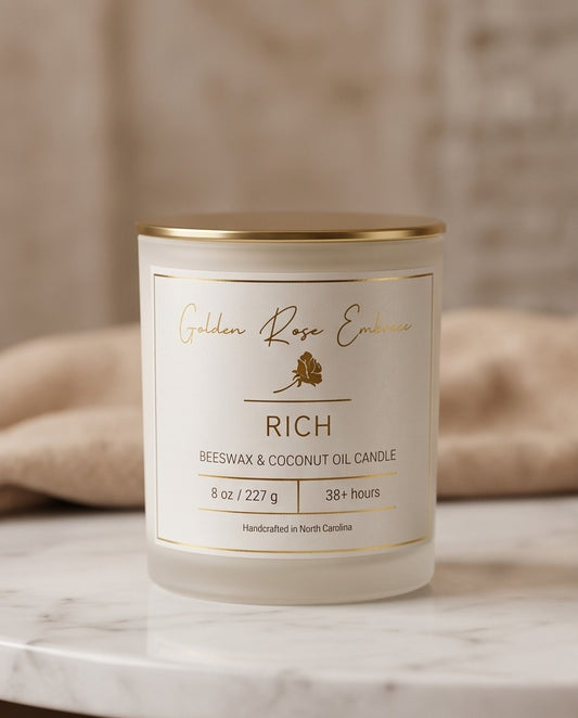 Rich 8oz Beeswax Candle.
Frosted glass, metallic gold lid, and woodwick.
Notes of Citrus, Cardamom, Palo Santo, Saffron, Violet, Wood, Sandalwood, Smoke, Amber.

A spicy warm woody scent infused with citrus, saffron, amber, violet & sandalwood. A luxurious rich fragrance that creates an inviting and sensual experience.

Custom beeswax candle blended with organic coconut oil and fragrances infused with clean nontoxic fragrance and natural essential oils. 