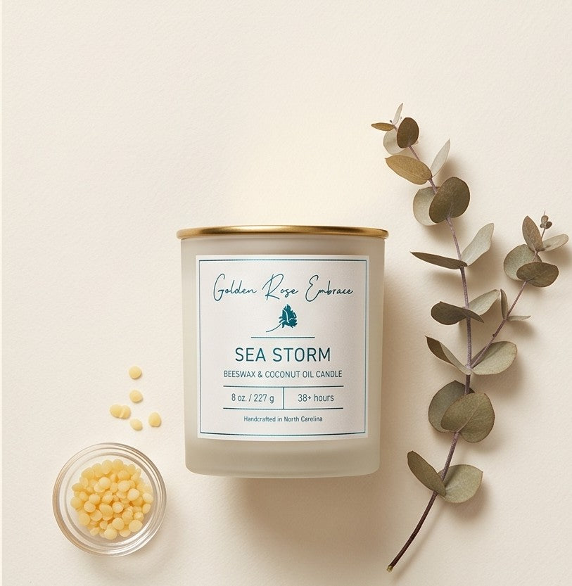 Sea Storm 8oz Beeswax Candle.
Frosted glass, metallic gold lid, and woodwick.
Notes of Ozone, Linen, Eucalyptus, Sea Salt, Freesia, Moss, Powder.

A light and airy scent of clean freshness and crisp linen, freesia, sea salt, eucalyptus, and moss to create a calming and peaceful vibe.

Custom beeswax candle blended with organic coconut oil and fragrances infused with clean nontoxic fragrance and natural essential oils. 