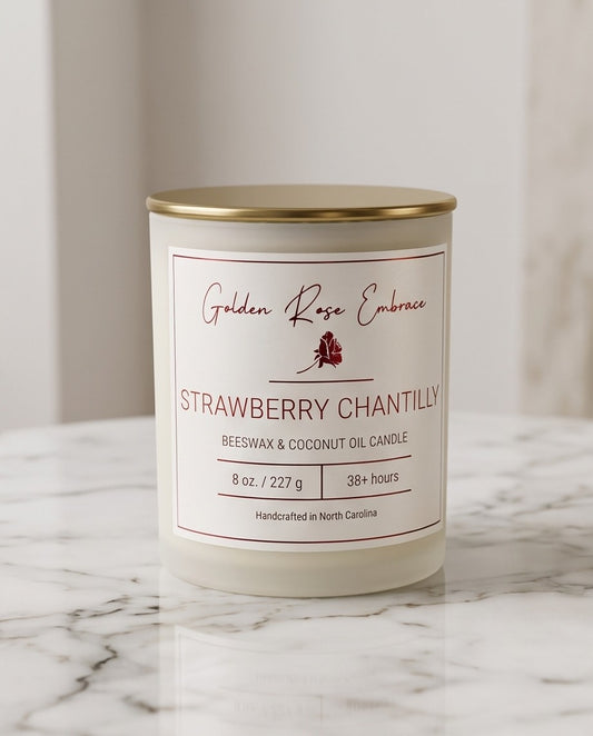 Strawberry Chantilly 8oz Beeswax Candle. 
Frosted glass jar, gold metallic lid, and woodwick. 
Notes of Green Leaves, Lemon, Strawberry, Cream, Sugar, Light Musk
Elevate your space with the mouth-watering aroma of sweet strawberries, creamy vanilla, and zesty lemon. This candle will transport you to the classic Wimbledon experience.
Custom beeswax candle blended with organic coconut oil and fragrances infused with clean nontoxic fragrance and natural essential oils. 