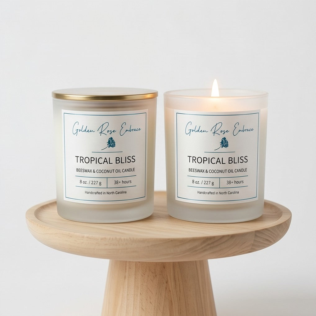 Tropical Bliss 8oz Beeswax Candle. 
Frosted glass jar, Gold metallic lid. Woodwick. 
Notes of Mango, Orange, Pineapple, Blood Orange, Peach, Banana, Apple, Coconut, Tonka, Vanilla, Green, Rose, Jasmine, Violet, Lavender, Resin, Musk, Paprika, Red Pepper, Pimento Leaf, Black Tea, Teakwood, Vetiver, and Golden Amber. A heavenly tropical aroma of guava, passionfruit, mango, pineapple, and coconut. Custom beeswax candle blended with organic coconut oil and nontoxic fragrances and essential oils.